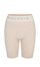 Load image into Gallery viewer, NAGNATA Balati Biker short in cream sandstone colourway, available at Amara Home.
