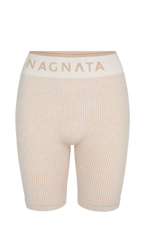 NAGNATA Balati Biker short in cream sandstone colourway, available at Amara Home.