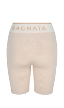 Load image into Gallery viewer, NAGNATA Balati Biker short in cream sandstone colourway, available at Amara Home.
