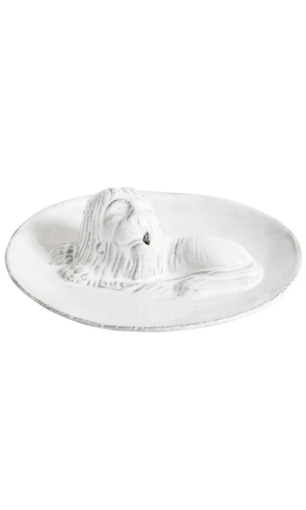 Astier de Villatte Lion on Saucer ceramic incense holder handmade in Paris using black clay and dipped in white glaze, available at Amara Home.